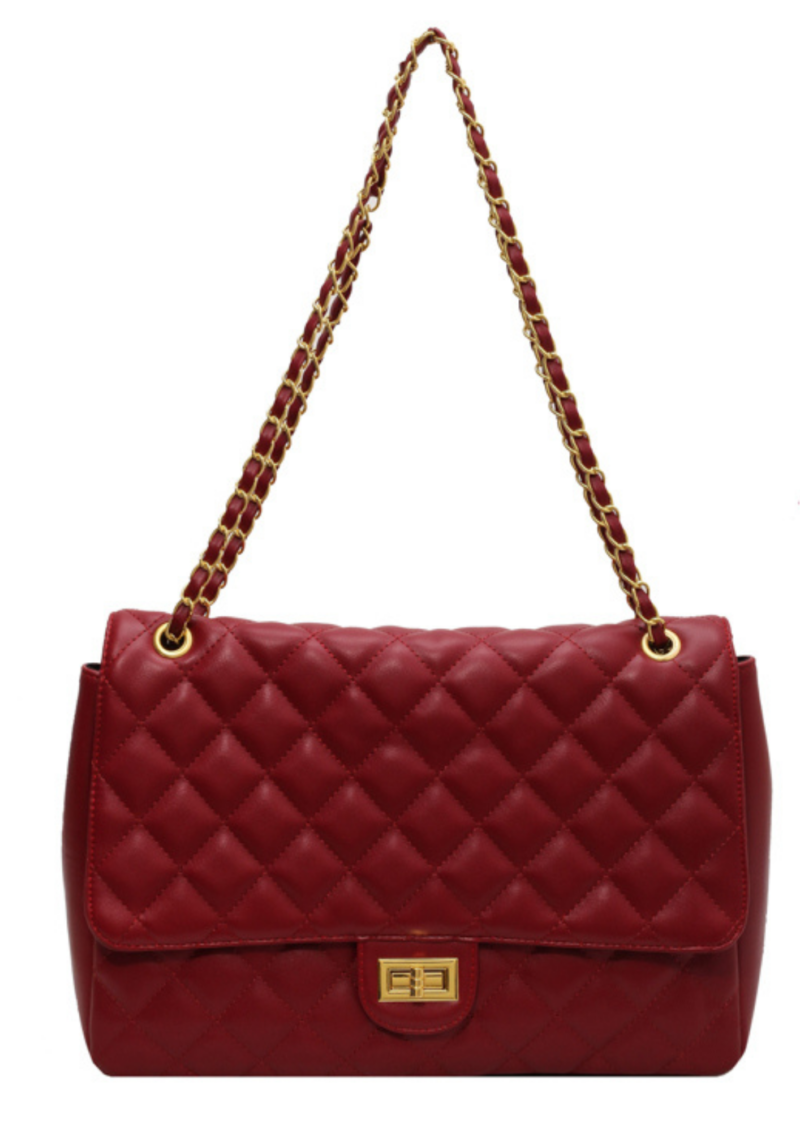 The Colonial Couture Crossbody is a classic yet stylish addition to your wardrobe, featuring a solid color design and a timeless square lock clasp. This large capacity crossbody bag is crafted with meticulous attention to detail, ensuring both functionality and fashion-forward appeal.
