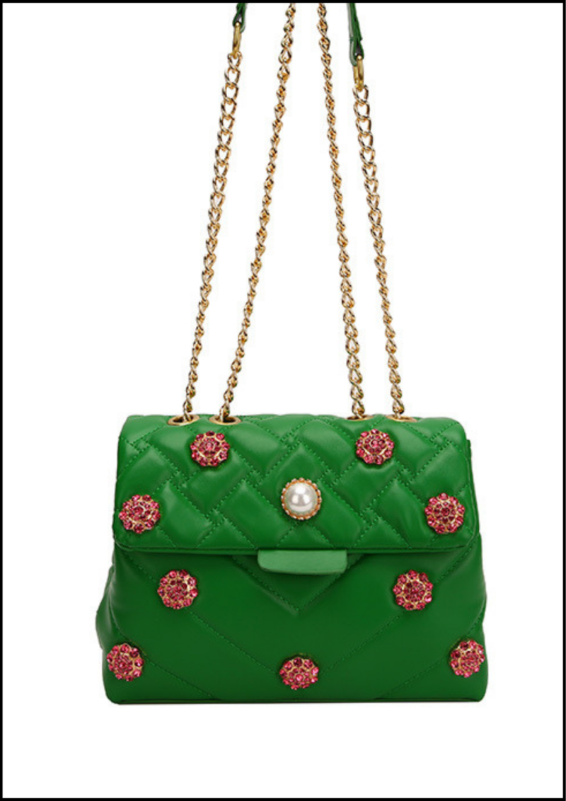 The London Rani Sling, Women's Medium Summer PU Leather Flower Classic Style Square Zipper Shoulder Bag from Papadoró India is a delightful fusion of functionality and elegance. Crafted with high-quality PU leather, this bag promises durability and a luxurious feel. The medium size offers ample space to carry your essentials, while the square shape adds a modern touch to its classic design. The intricate flower detailing on the bag lends it a charming and feminine appeal, making it a perfect accessory for both casual outings and semi-formal occasions. The soft and smooth texture of the PU leather provides a comfortable carrying experience, while the sturdy construction ensures long-term use. The zipper closure guarantees the safety of your belongings, allowing you to carry your essentials with peace of mind.