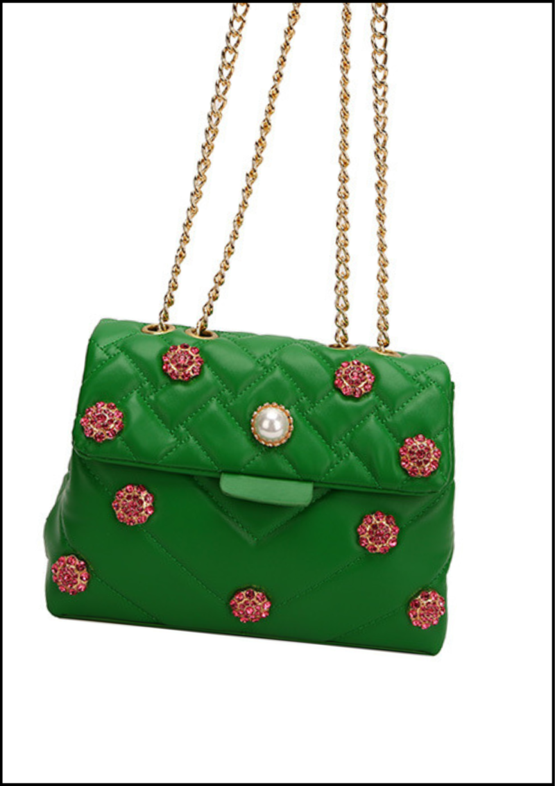 The London Rani Sling, Women's Medium Summer PU Leather Flower Classic Style Square Zipper Shoulder Bag from Papadoró India is a delightful fusion of functionality and elegance. Crafted with high-quality PU leather, this bag promises durability and a luxurious feel. The medium size offers ample space to carry your essentials, while the square shape adds a modern touch to its classic design. The intricate flower detailing on the bag lends it a charming and feminine appeal, making it a perfect accessory for both casual outings and semi-formal occasions. The soft and smooth texture of the PU leather provides a comfortable carrying experience, while the sturdy construction ensures long-term use. The zipper closure guarantees the safety of your belongings, allowing you to carry your essentials with peace of mind.